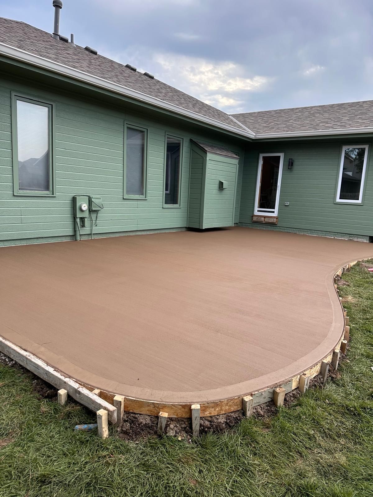 8. Colored Concrete Patio Install ✅